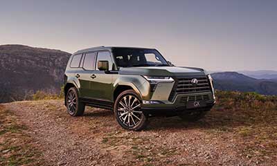 Lexus GX Sports Luxury model parked on a rocky clifftop. 