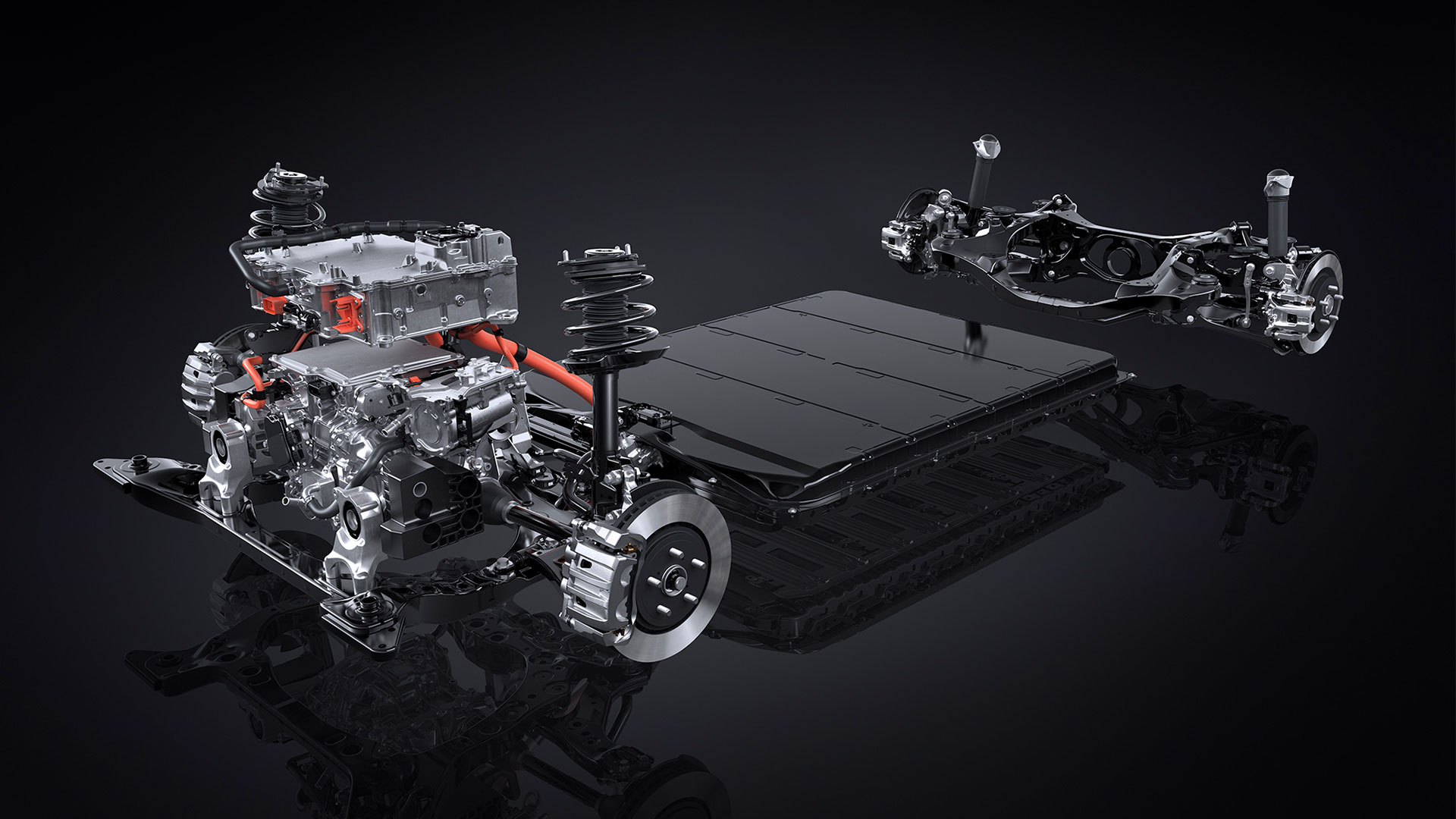 The chassis frame of a Lexus ES sedan vehicle in a studio setting.